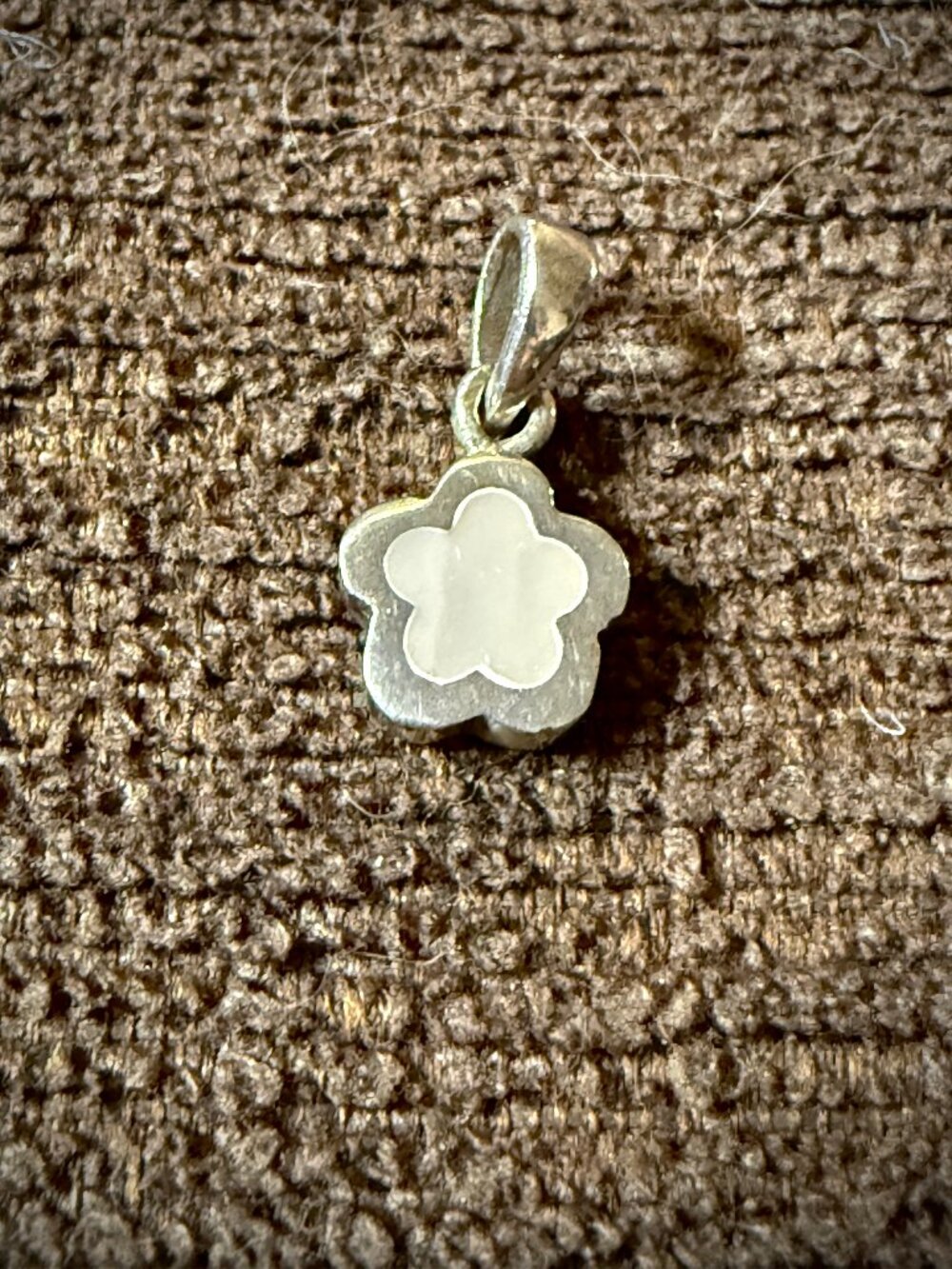 Sterling silver four-leaf clover pendant with a white mother-of-pearl inlay